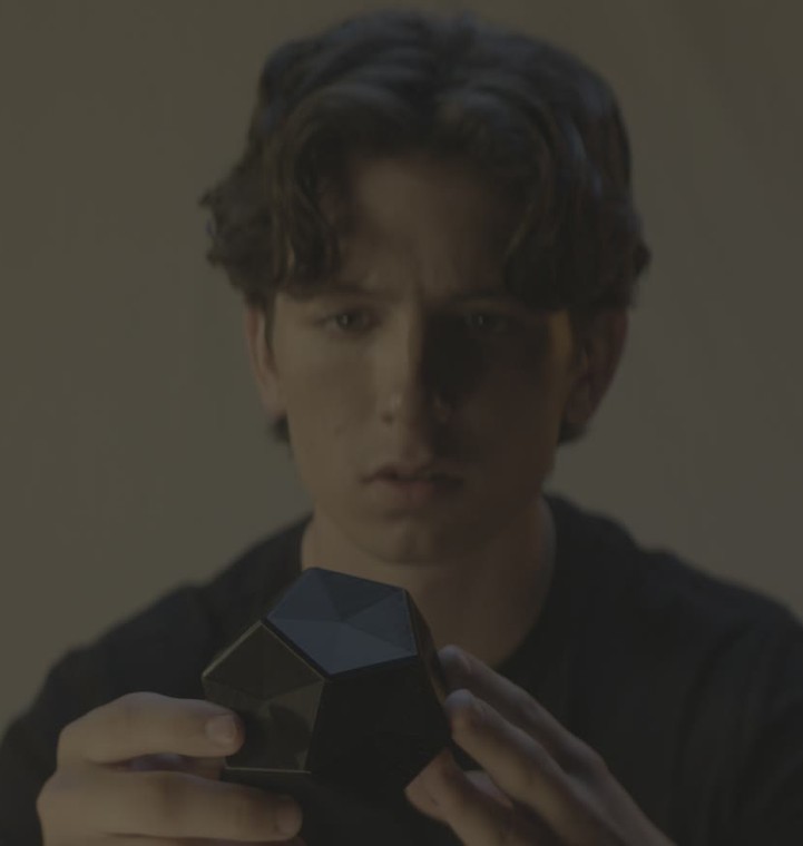 Adam holding the cube